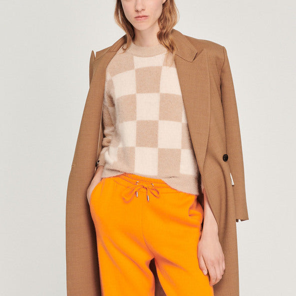 Pull en maille à motif damier Faume - seconde main
