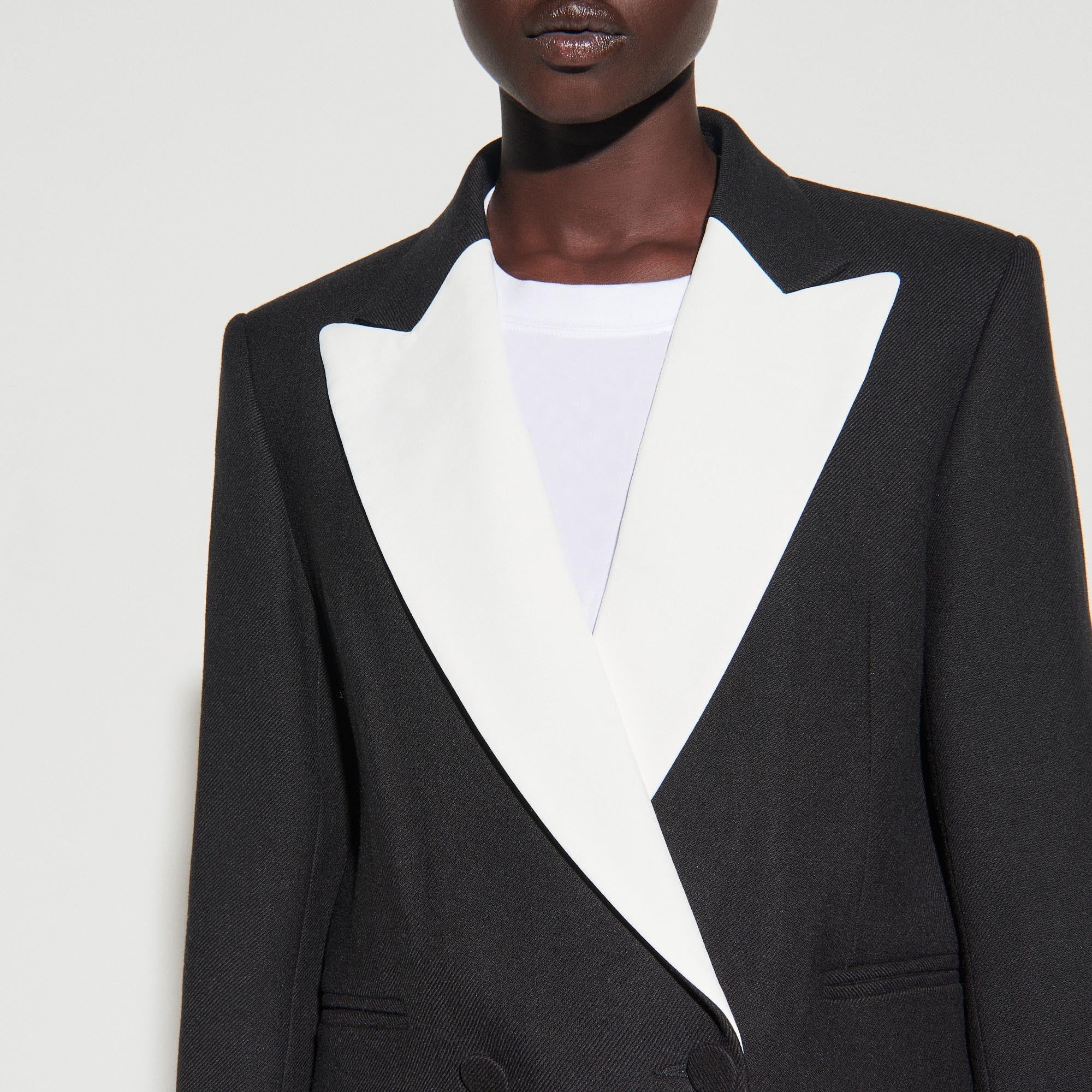 Veste tailleur au revers contrasté Faume - seconde main