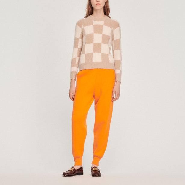 Pull en maille à motif damier Faume - seconde main